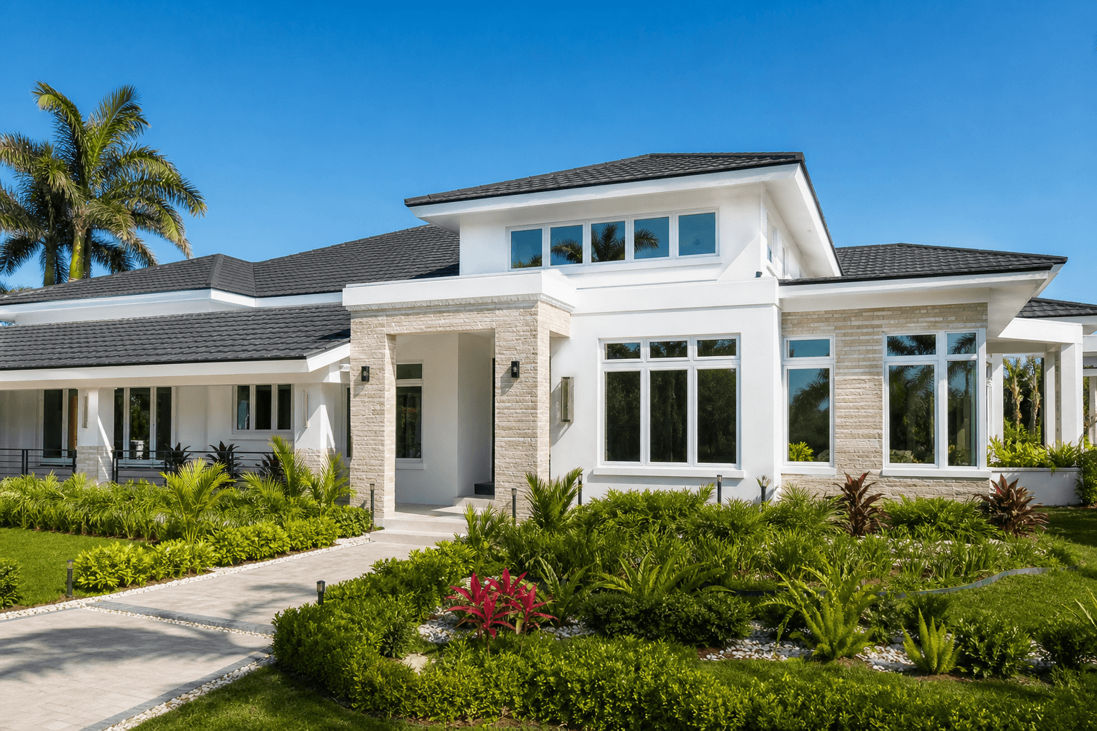 Contemporary home elevation with white Domus-style window frames